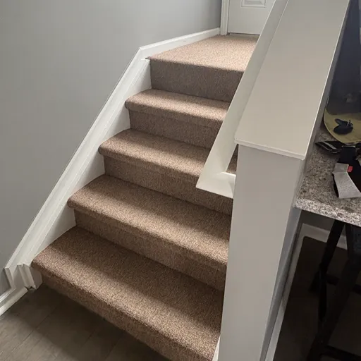 Stair runner installation at Main Floor